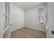Bright bedroom with hardwood floors and a window with natural light at 2340 Beeblossom Pl, Fuquay Varina, NC 27526