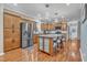 Spacious kitchen boasting stainless steel appliances, a center island, and modern lighting at 250 Spring View Ln, Pittsboro, NC 27312