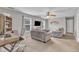 Spacious second living area with desk, tv, two sofas and light paint at 250 Spring View Ln, Pittsboro, NC 27312