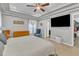 This primary bedroom has lots of natural light, a ceiling fan, and is carpeted at 250 Spring View Ln, Pittsboro, NC 27312