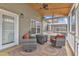 Relaxing screened porch with seating and a view of the backyard at 250 Spring View Ln, Pittsboro, NC 27312