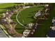 Lush community park with walking trails, play areas, and vibrant landscaping from an aerial perspective at 3015 Dog Rose Drive Lot 170 Dr, Durham, NC 27703