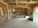 Open living room with wood framing and an arched ceiling feature at 3015 Dog Rose Drive Lot 170 Dr, Durham, NC 27703