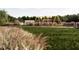 Neighborhood playground featuring swings, slides, and an accessible play area for children at 3015 Dog Rose Drive Lot 170 Dr, Durham, NC 27703
