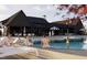Resort-style pool area with comfortable lounge chairs and shaded seating for relaxation at 3015 Dog Rose Drive Lot 170 Dr, Durham, NC 27703