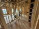 Unfinished room featuring wood framing, electrical wiring, and plumbing at 3015 Dog Rose Drive Lot 170 Dr, Durham, NC 27703