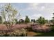 Community walking path surrounded by ornamental grasses and flowering trees, creating a scenic and tranquil environment at 3015 Dog Rose Drive Lot 170 Dr, Durham, NC 27703