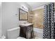 Modern bathroom featuring tile surround and updated vanity at 304 22Nd St, Butner, NC 27509