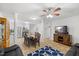 Open living space with a dining area and a kitchen, bathed in natural light at 304 22Nd St, Butner, NC 27509