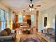 Inviting living room showcasing a blend of classic decor and modern lighting fixture at 309 College St, Oxford, NC 27565
