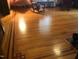 Striking hardwood floors with a decorative border add character to the living area at 309 College St, Oxford, NC 27565