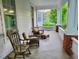 Inviting porch with rocking chairs and comfortable seating area, perfect for relaxing outdoors at 309 College St, Oxford, NC 27565