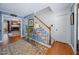 Welcoming foyer with hardwood floors, staircase, and an inviting view into the living room at 3222 Windmere Dr, Sanford, NC 27330