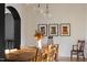 Dining room featuring long table with vase and framed art at 336 Timberline Dr, Pittsboro, NC 27312
