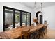 Dining room featuring long table and view to the patio at 336 Timberline Dr, Pittsboro, NC 27312