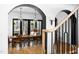 Bright dining room featuring an extra long wooden table and modern hanging pendant lights at 336 Timberline Dr, Pittsboro, NC 27312