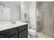 Cozy bathroom featuring a stylish vanity, toilet, and a glass-enclosed shower, creating a functional and appealing space at 3929 Glenlake Garden Dr, Raleigh, NC 27612