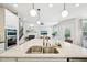 Gourmet kitchen showcasing a marble island, stainless steel appliances, and an open layout at 3929 Glenlake Garden Dr, Raleigh, NC 27612