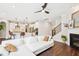 Open-concept living space seamlessly connects the living room with the kitchen and staircase at 3929 Glenlake Garden Dr, Raleigh, NC 27612