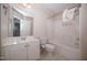 Bathroom with a white vanity, toilet, and shower/tub combo with white shower curtain at 400 Leacroft Way, Morrisville, NC 27560