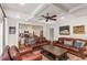 Spacious living room with a coffered ceiling adjacent to the kitchen at 442 Hunters Pointe Rd, Nashville, NC 27856