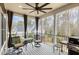 Inviting outdoor porch area with seating and a grill, perfect for relaxing and entertaining guests at 442 Hunters Pointe Rd, Nashville, NC 27856