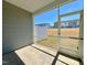 Covered porch overlooks a spacious backyard with neighboring homes and clear blue skies above at 5014 Kota St, Raleigh, NC 27610