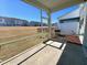 Screened porch overlooks a lush backyard with scenic views of the surrounding neighborhood and blue skies above at 5014 Kota St, Raleigh, NC 27610