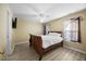 Bright bedroom with neutral walls, ceiling fan, and ample natural light at 513 Jaffiley Ct, Wake Forest, NC 27587