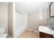Neutral bathroom featuring a tile floor and tub shower at 513 Kenway St, Garner, NC 27529