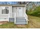 Inviting front entrance showcasing a freshly painted door and steps, offering a warm welcome to guests and homeowners alike at 513 Kenway St, Garner, NC 27529