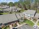 Community aerial view showcases lush green lawns and well-maintained landscaping at 60 Justin Ct, Durham, NC 27705