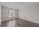 Bright bedroom with natural light and wood-look flooring at 60 Justin Ct, Durham, NC 27705