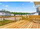 Private wooden deck overlooks backyard and homes in surrounding neighborhood at 605 Silverado Sunset Loop, Wendell, NC 27591