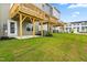 View of backyard patios, lawn space, and exterior features, enhancing the property's appeal at 605 Silverado Sunset Loop, Wendell, NC 27591