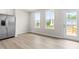 Bright kitchen eat in area featuring stainless steel appliances and access to a deck at 605 Silverado Sunset Loop, Wendell, NC 27591