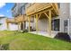 A green yard includes a concrete patio with wooden support beams at 607 Silverado Sunset Loop, Wendell, NC 27591