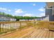 This home includes a spacious wooden deck for outdoor enjoyment at 607 Silverado Sunset Loop, Wendell, NC 27591