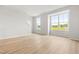 Spacious living room with natural light, hardwood floors, and neutral color palette at 607 Silverado Sunset Loop, Wendell, NC 27591