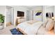 Inviting main bedroom with a TV, closet, and ensuite bathroom at 607 Silverado Sunset Loop, Wendell, NC 27591