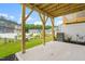Covered patio with concrete floor and wooden support beams at 607 Silverado Sunset Loop, Wendell, NC 27591