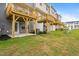 Well-maintained backyard with a patio and deck, perfect for outdoor enjoyment at 609 Silverado Sunset Loop, Wendell, NC 27591