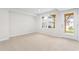 Unfinished basement with natural light and a door to the outside at 609 Silverado Sunset Loop, Wendell, NC 27591