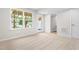 Finished basement with an egress window and a view into a full bathroom at 609 Silverado Sunset Loop, Wendell, NC 27591
