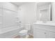 Bathroom features a bathtub with shower, toilet, and a vanity with sink at 609 Silverado Sunset Loop, Wendell, NC 27591
