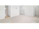 Spacious empty bedroom with carpet, walk in closet and attached bathroom at 609 Silverado Sunset Loop, Wendell, NC 27591