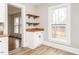 Corner nook featuring wooden shelving and a matching countertop with window views at 610 Peele St, Burlington, NC 27215