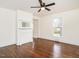 A living room boasting refinished hardwood floors, a decorative fireplace, and abundant light at 610 Peele St, Burlington, NC 27215