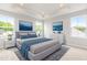 Bedroom with tray ceilings, recessed lights, and an ensuite bathroom at 611 Silverado Sunset Loop, Wendell, NC 27591