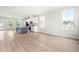 Bright, airy kitchen featuring a large island with seating and stainless steel appliances in an open layout at 611 Silverado Sunset Loop, Wendell, NC 27591